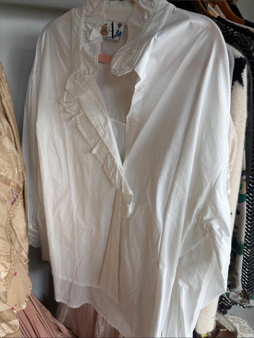 Ruffled White Button-Up Blouse